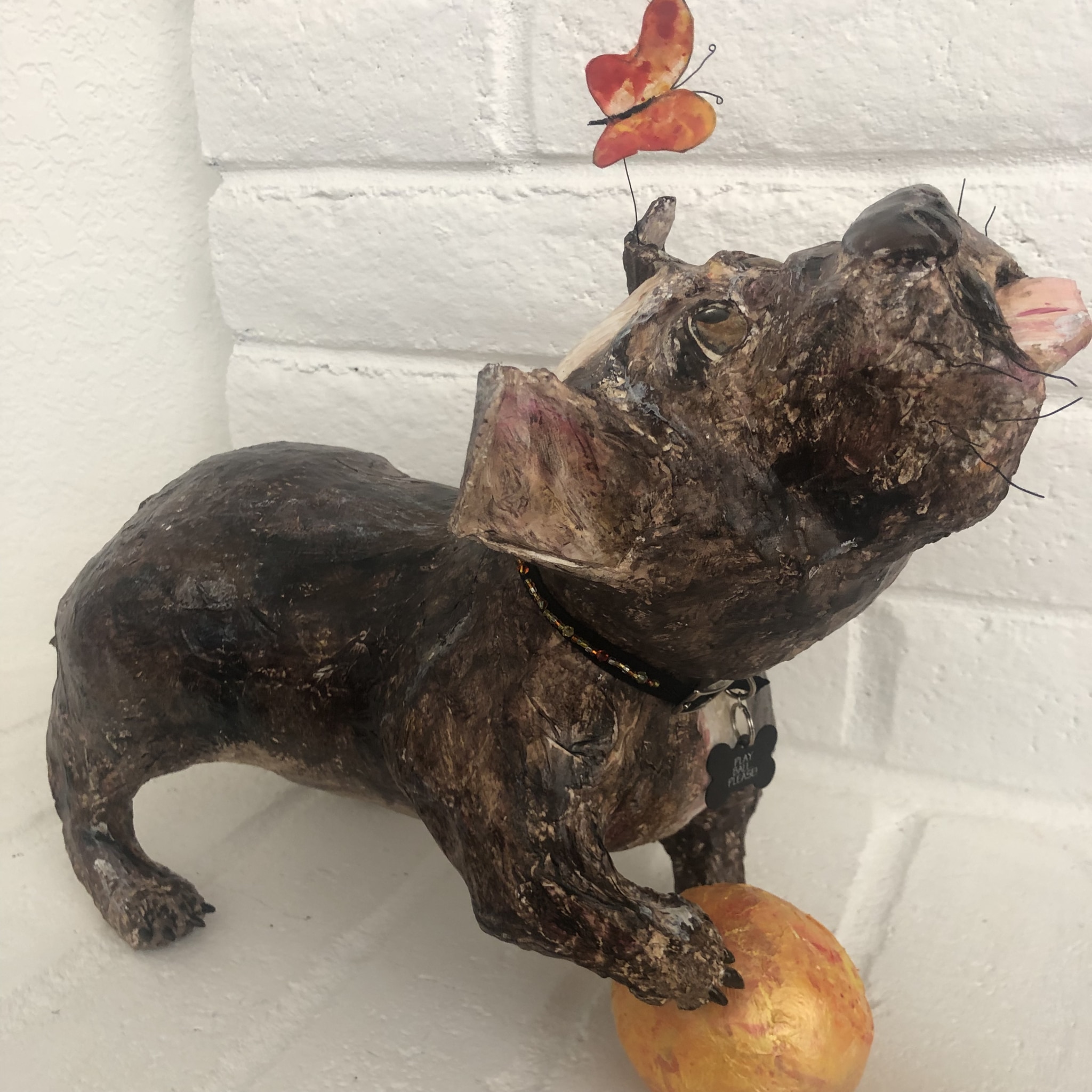 Play ball! Dog sculpture by Pam Jurach