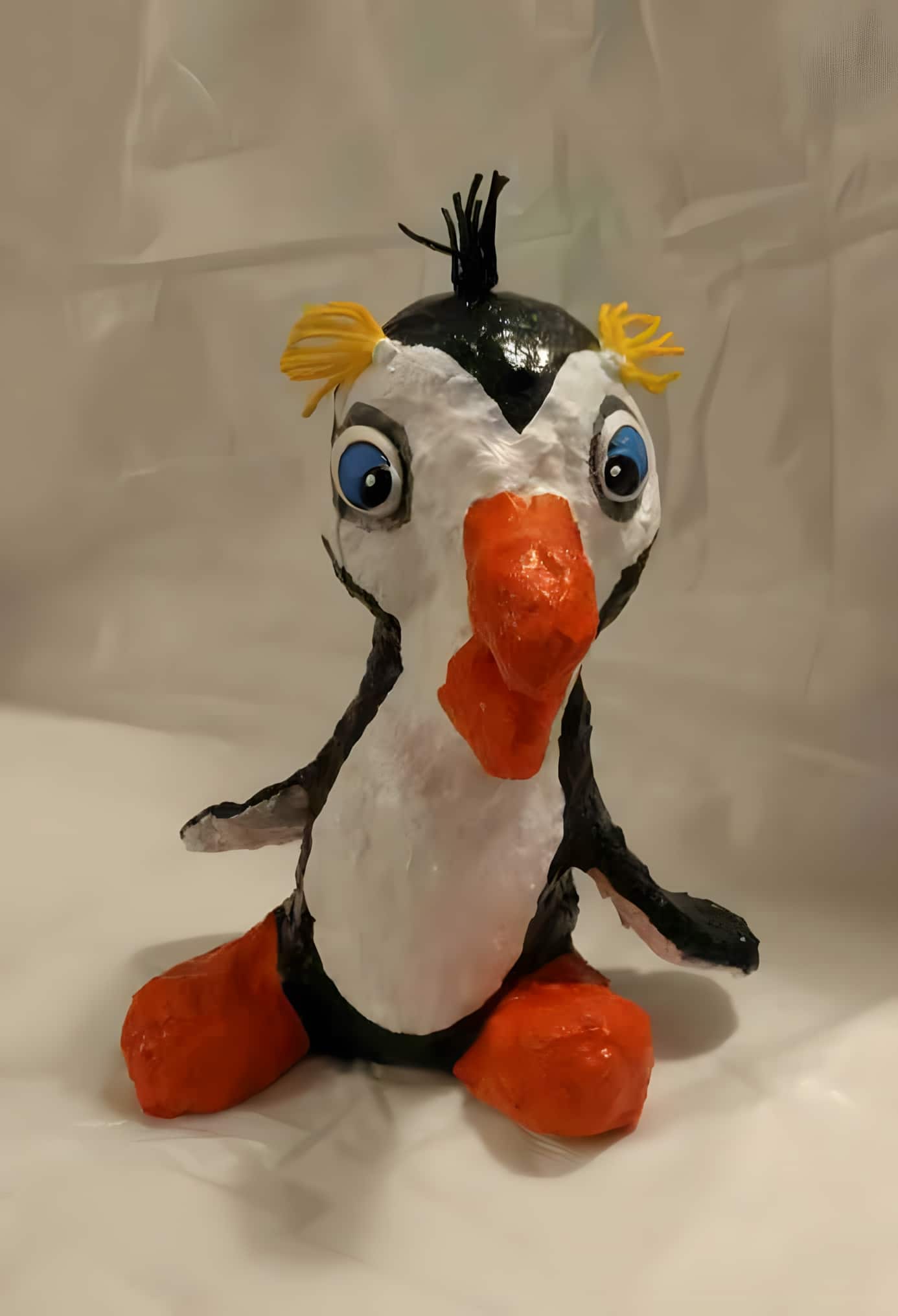 Balloon penguin in paper mache