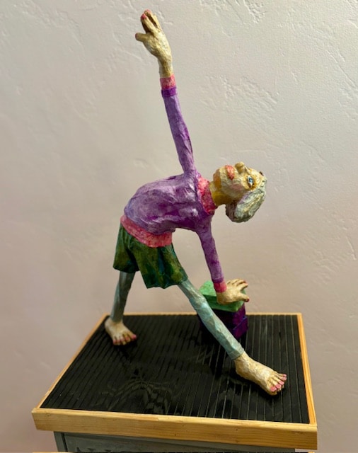 Yoga triangle pose paper mache sculpture made by Joanne Bookmyer