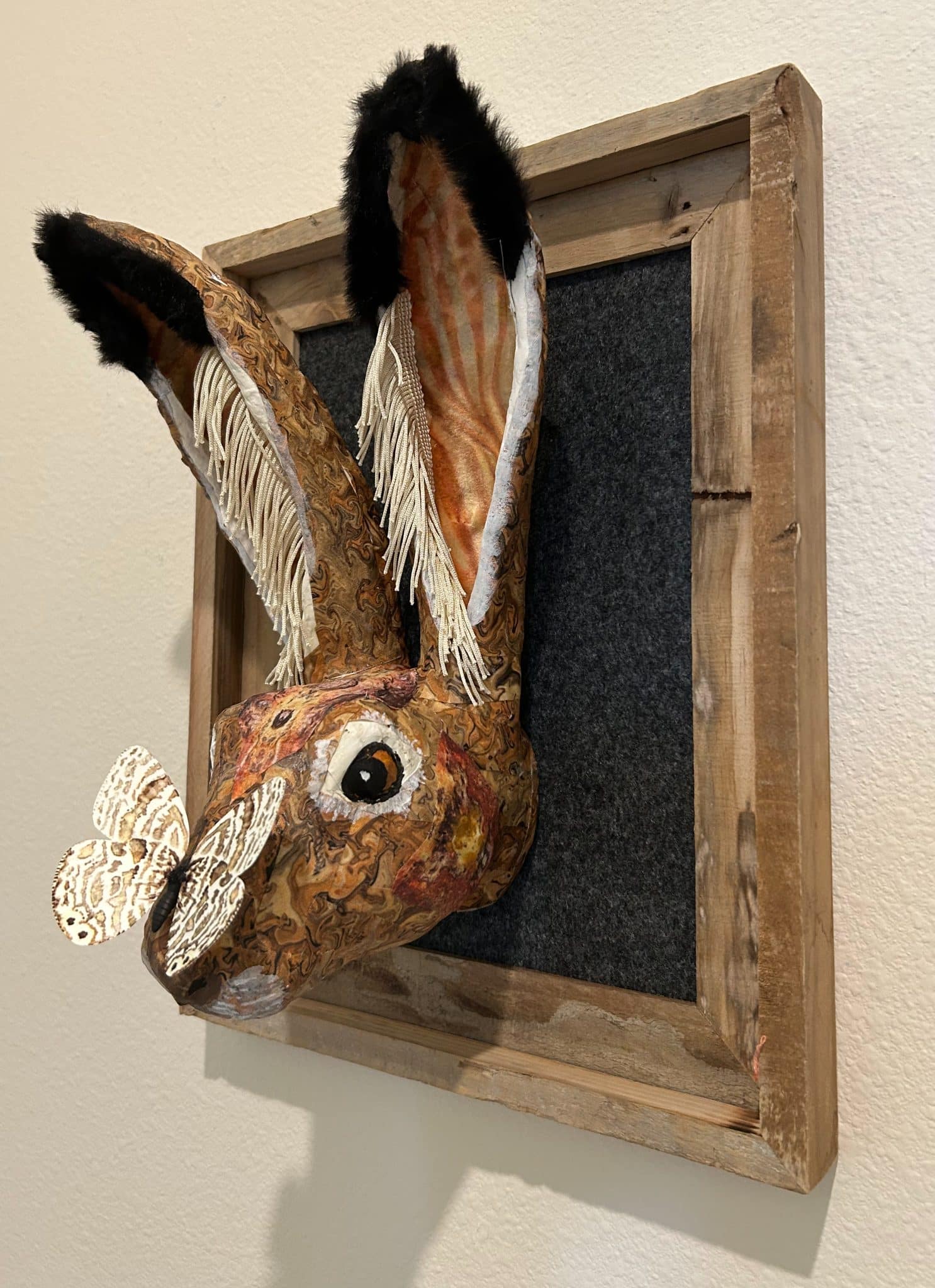 Whimsical jackrabbit wall sculpture made by Kristen Druckenbrodt