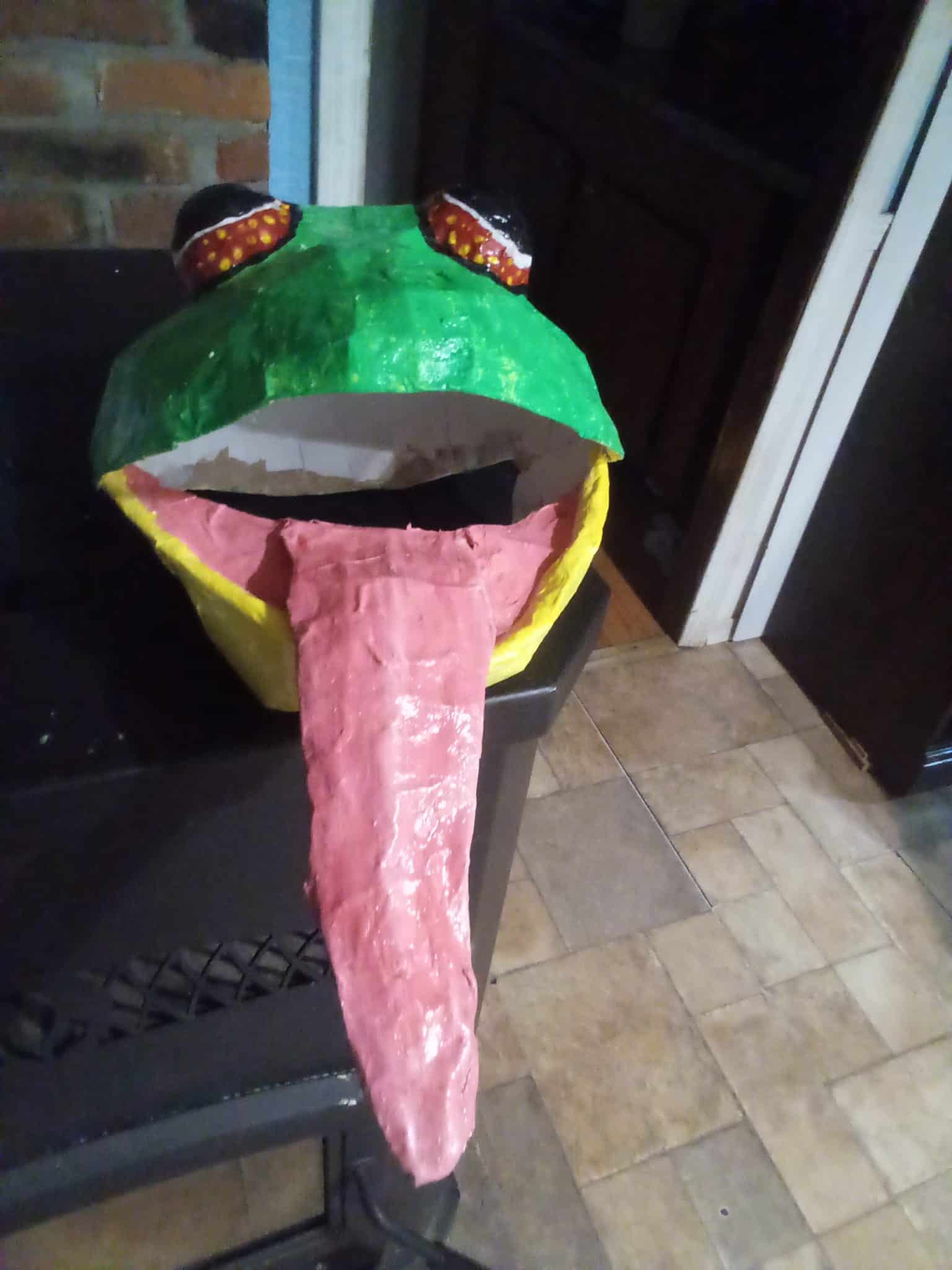 Paper mache frog mask made by Gail Swanson